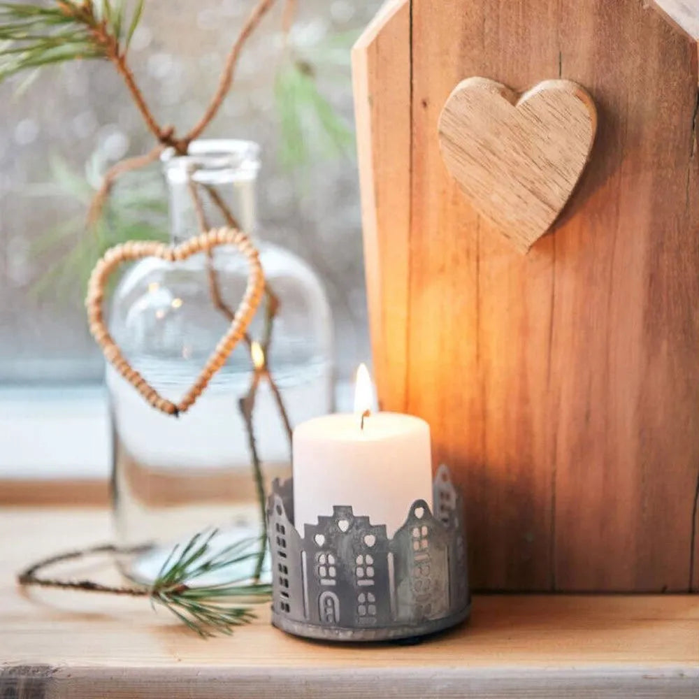 Punched houses Candle holder